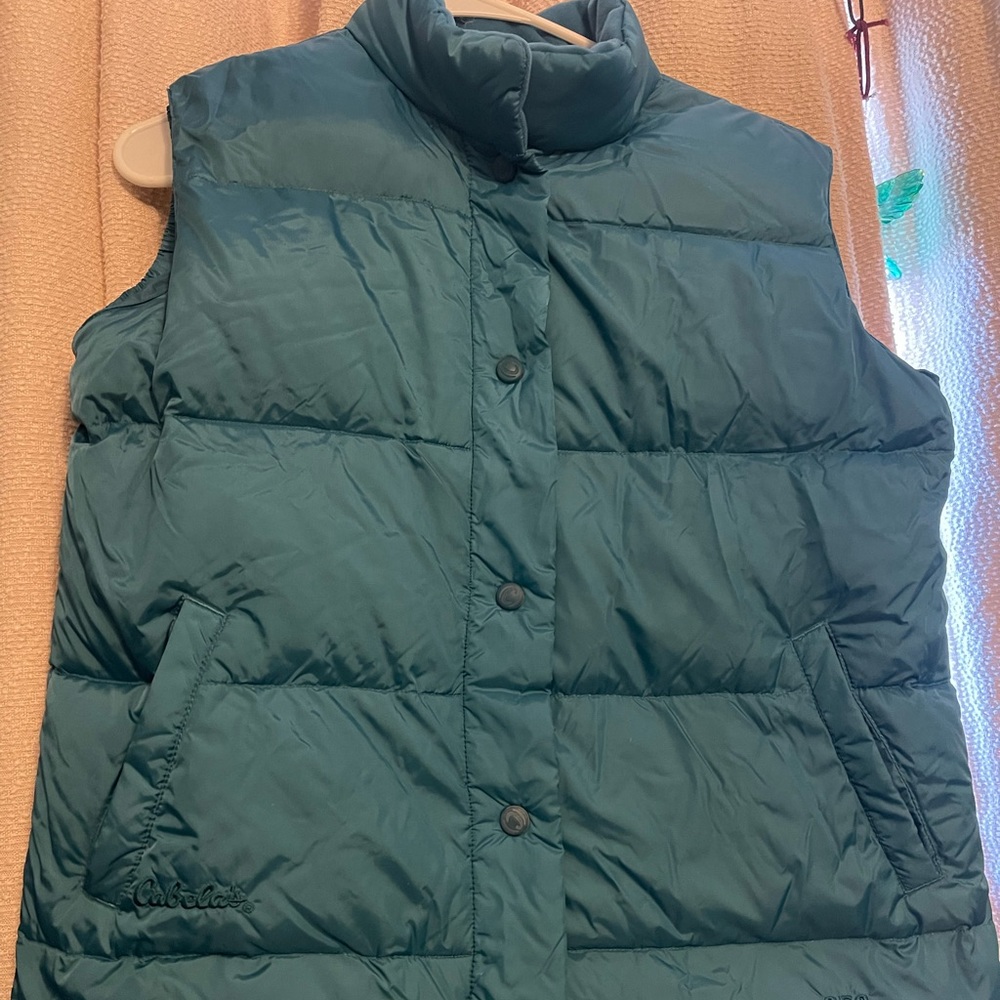 Cabelas premier northern goose down vest size small teal in color